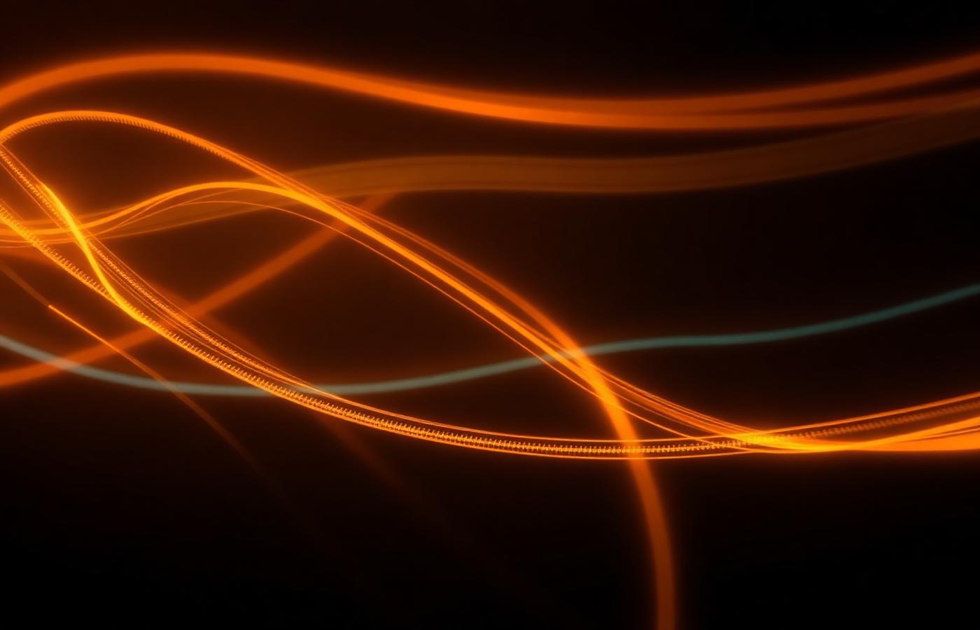 Warm ribbons of light suggesting an automated data flow